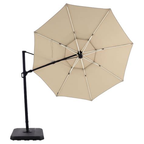 Make night-time dinners under the sky a memorable experience with the help of this offset umbrella. . Allen  roth 11ft umbrella assembly